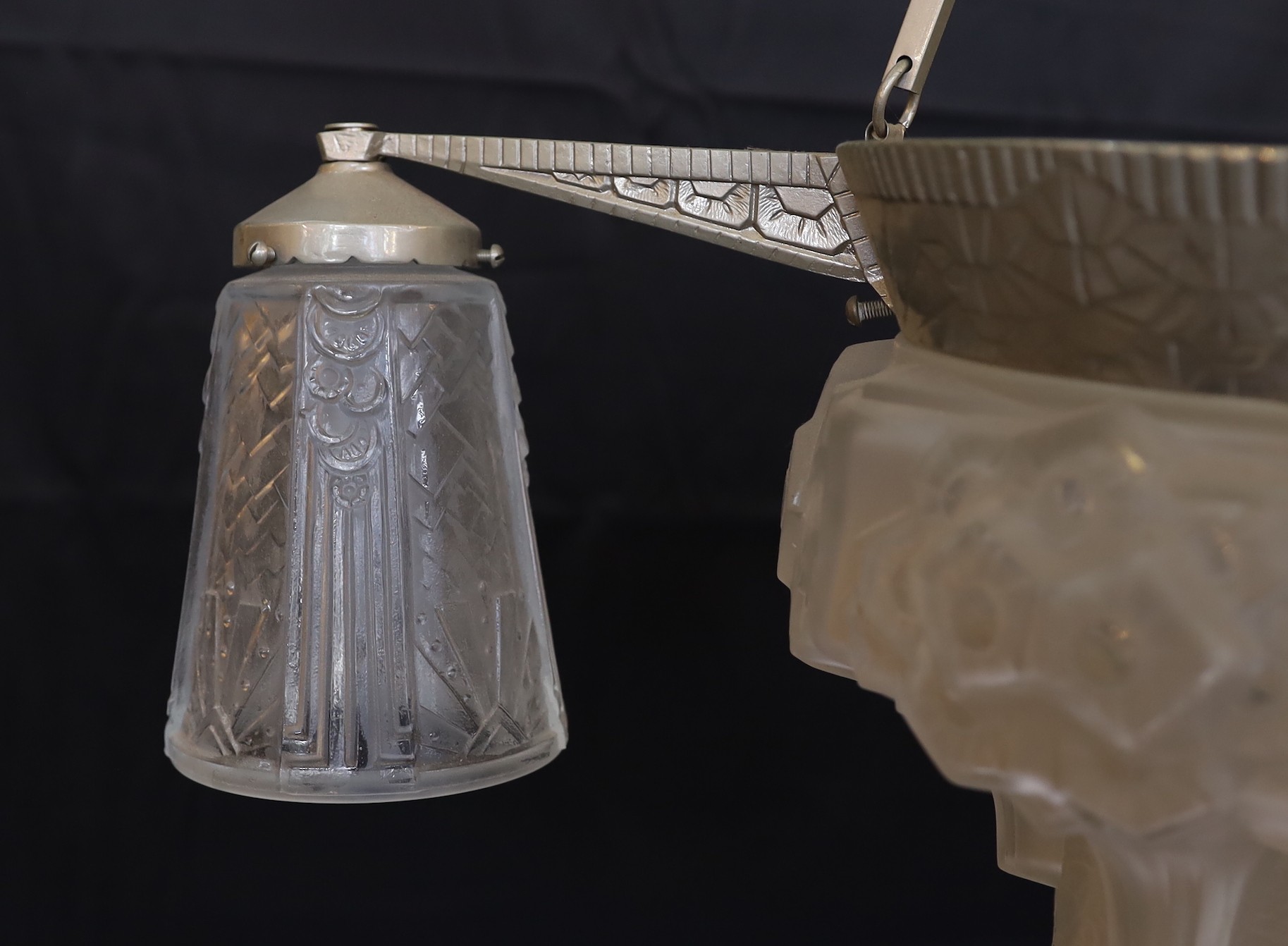 A French Art Deco silvered metal and frosted glass light fitting signed Muller, height 60cm. width 58cm